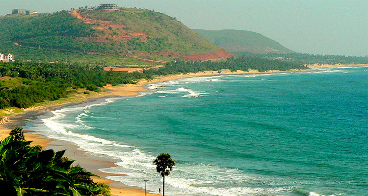 Rishikonda Beach Best places to visit in Visakhapatnam with golden sands, blue waters, and scenic coastal surroundings